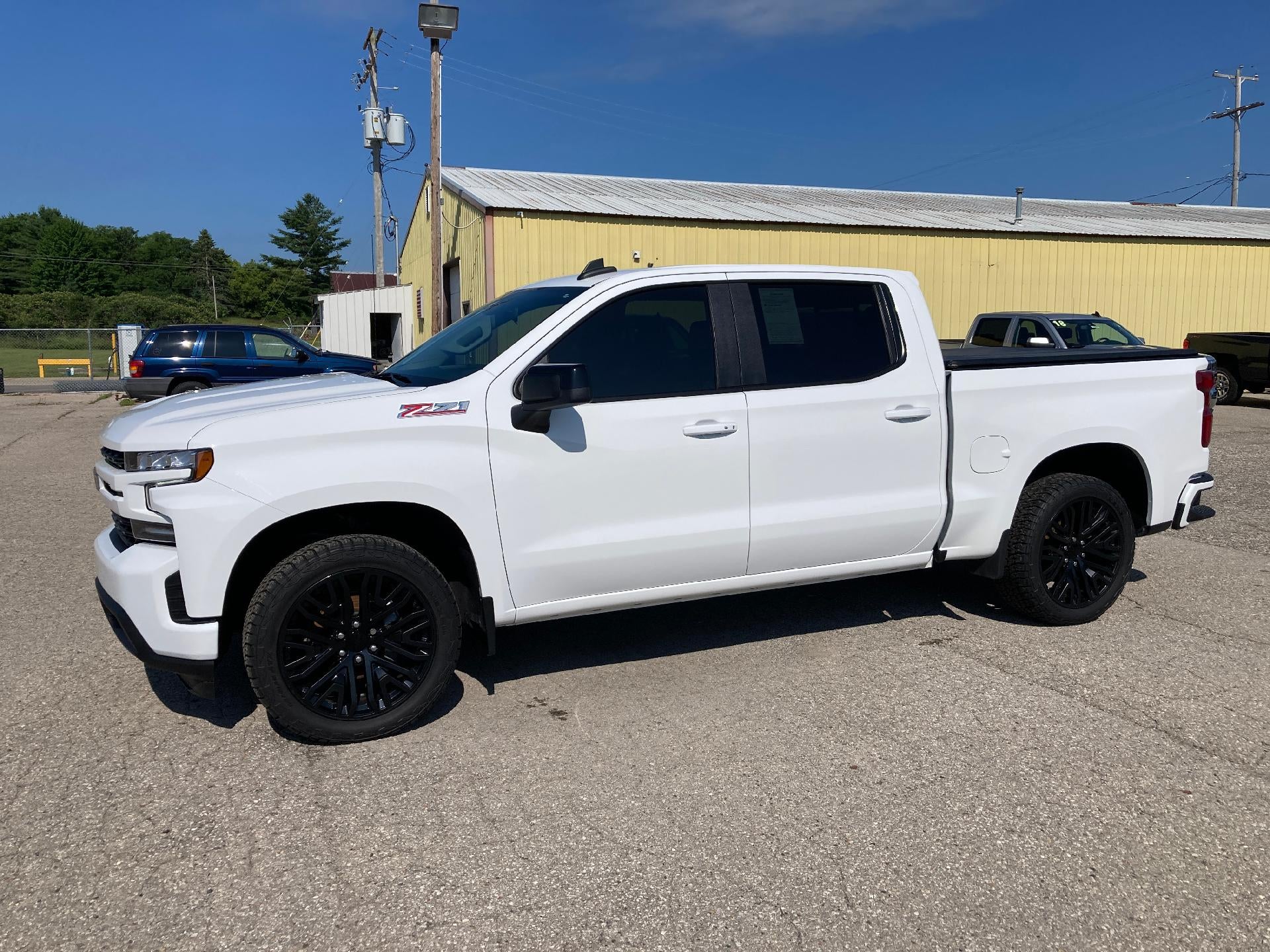 2022 Chevrolet Silverado 1500 LTD RST in Summit White — front three-quarter view